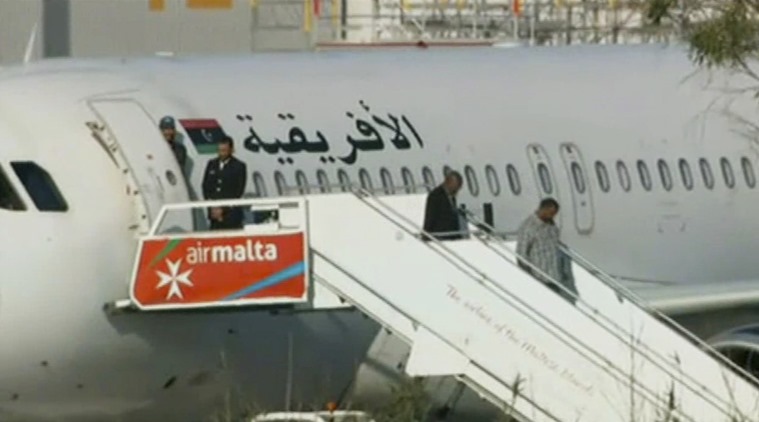 libyanplanehijackerssurrenderallpassengersfreed
